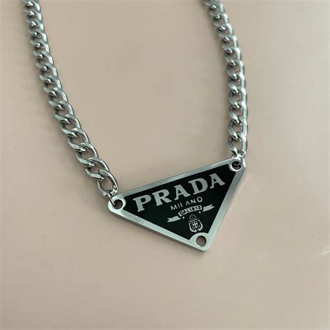 prada triangle necklace|prada necklace triangle price.